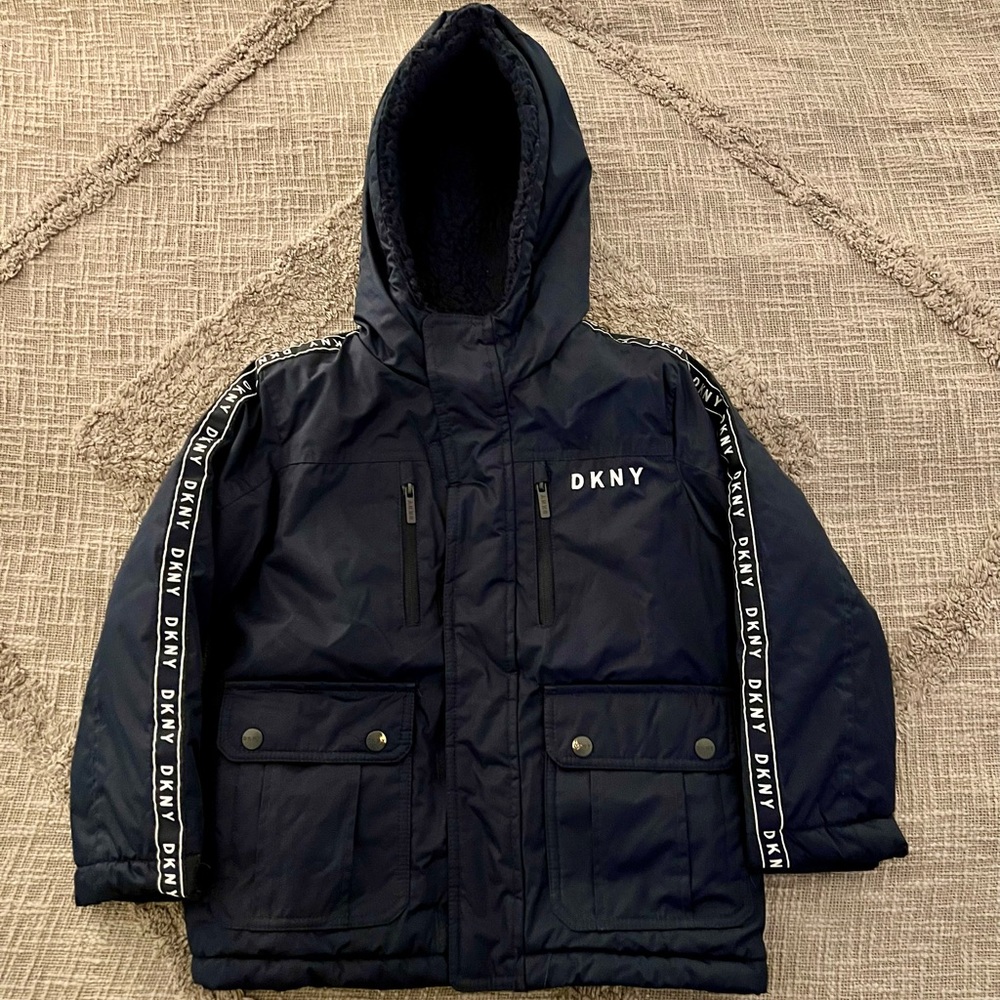 DKNY Boys Winter Jacket. Minor wear on front pocket snaps. Size 5/6.